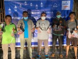 DPRD Boy Warongan Bersama AFC Bagikan Daging Qurban